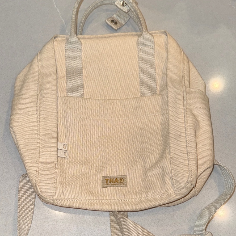 TNA Cream Canvas Backpack